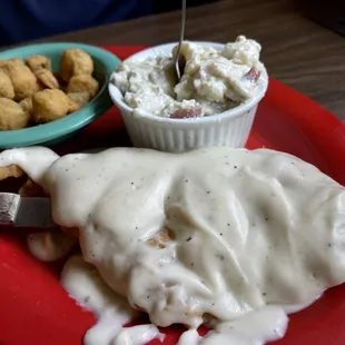 Chicken Fried Chicken with gravy, Potato Salad, and Fried Okra