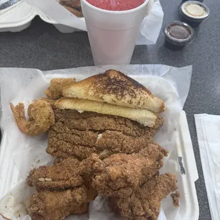 2 catfish 2 shrimp 4 wings with hush puppies as a side.