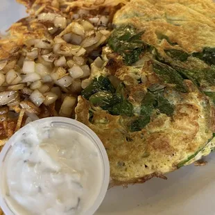 Greek Omelette, hash browns  with grilled onion