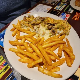 One of Granny's sausage and mozzarella cheese omelet with crispy fries.