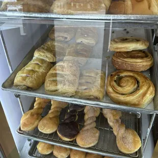a display case full of baked goods