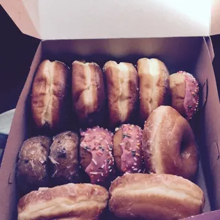 a dozen donuts in a box