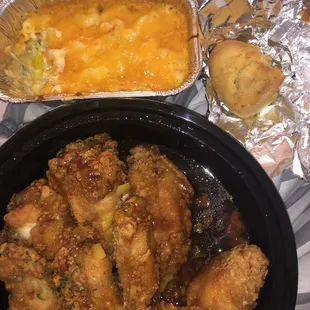 Peach bourbon wings with mac and cheese side order and heart shape cornbread (took a bite )