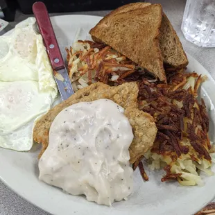 County fried steak, over easy eggs, crispy hash browns, &amp; wheat toast.