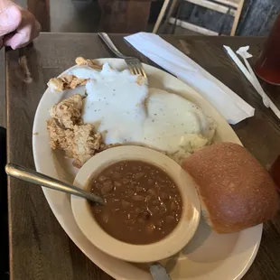 Chicken fried chicken, mashed potatoes, brown beans with roll