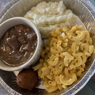 Beef tips, Mac &amp; cheese, mashed potatoes &amp; a hush puppy