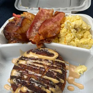 Salmon Cake, Scrambled eggs, bacon, old bay maple potatoes