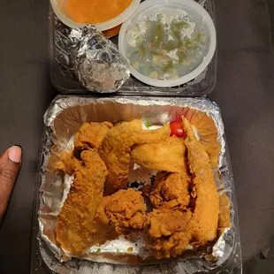 Fried chicken wings, yams and collard greens