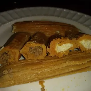 Left regular pork; rt, cream cheese/chicken with jalapeno.