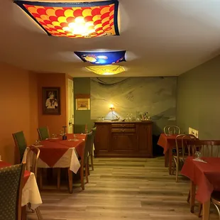 two main dining rooms and one other in the wine bar area