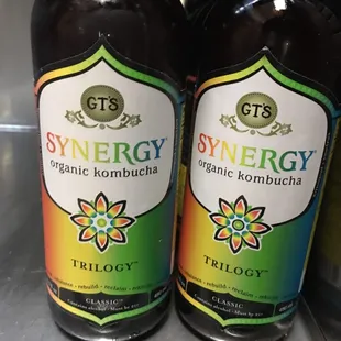 two bottles of synergy organic kombucha