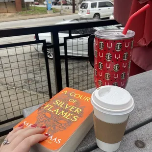 a book and a cup of coffee