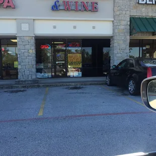 a car parked in front of a store