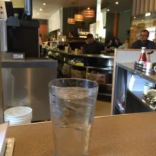 a glass of water on a counter
