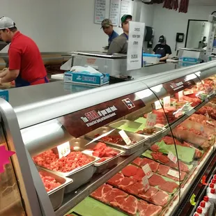 customers in the meat section