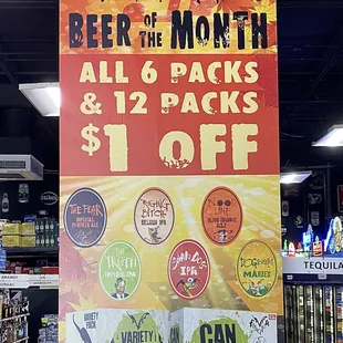 a beer of the month sign