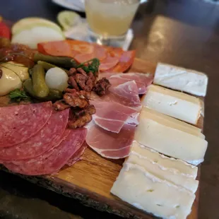 a platter of meat and cheese