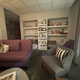 a woman sitting on a couch