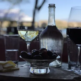 a glass of wine and cheese