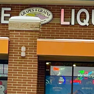 the front of a wine and liquor store