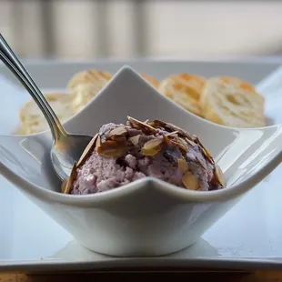 Cranberry goat cheese spread with fresh bread.