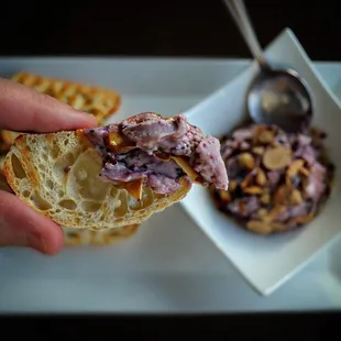 cranberry goat cheese spread with fresh toasted baguette slices.