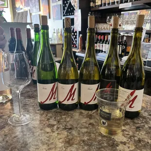 bottles of wine on a bar