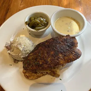 Blacked Crab Stuffed Redfish w/ Au gratin sauce