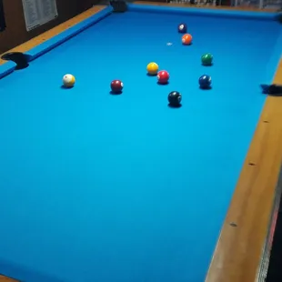 a pool table with balls on it