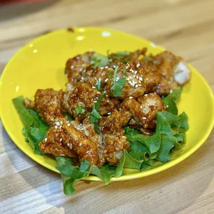 Korean Chicken Bites - Perfectly seasoned double-fried chicken coating with garlicky chili sauce