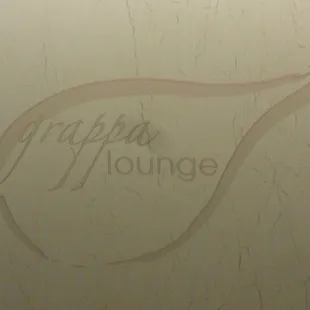 the logo on the wall