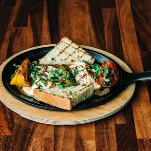 heirloom tomatoes and sizzling burrata