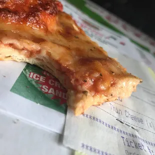 cheese pizza w/hair baked inside