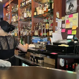 a woman at the bar