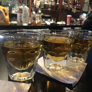 three glasses of alcohol