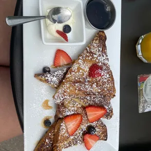 French toast with fresh berries and maple syrup