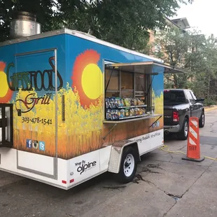 a food truck parked in a parking lot