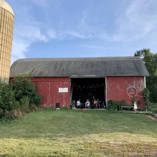 a red barn and silo