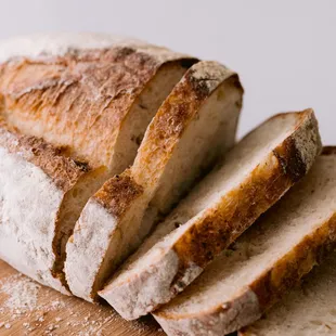 sliced loaf of bread on a cutting board