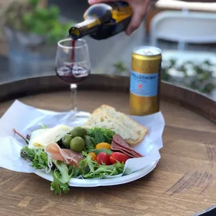 enjoy the antipasto salad and our handcrafted wine outdoors