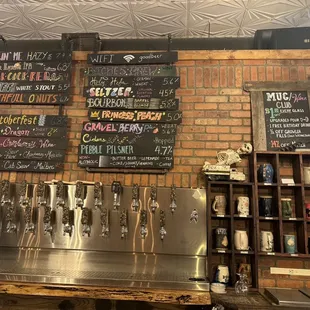 menus on a brick wall