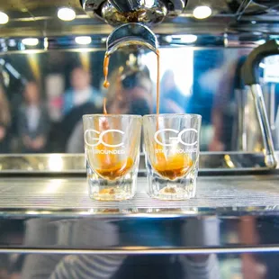 two shot glasses filled with coffee