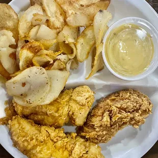 Chicken tenders and fries potatoes