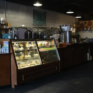 Bakery case and bar seating.