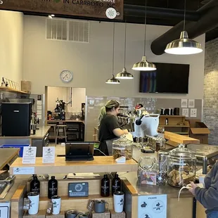 a man working in a coffee shop