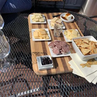 Cheese, sausage, and cracker platter.