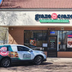 Our store front and delivery car.