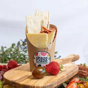 a variety of cheese and fruit