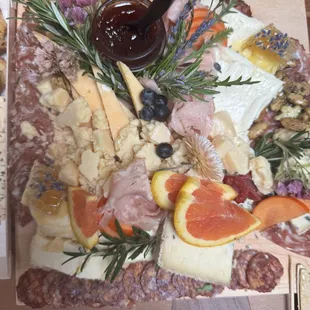 Medium sized cheese and charcuterie board. Serves 6.