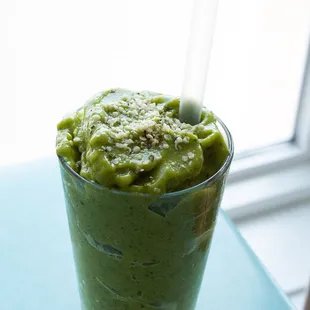a green smoothie in a glass